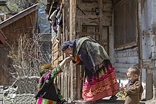 Greetings_in_Pakistan_-_Kalash_women_greet_each_other_by_kissing_their_hands